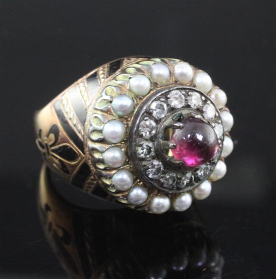 A 19th century French? gold and silver, cabochon garnet, split pearl diamond and black enamel circular dress ring, size M.